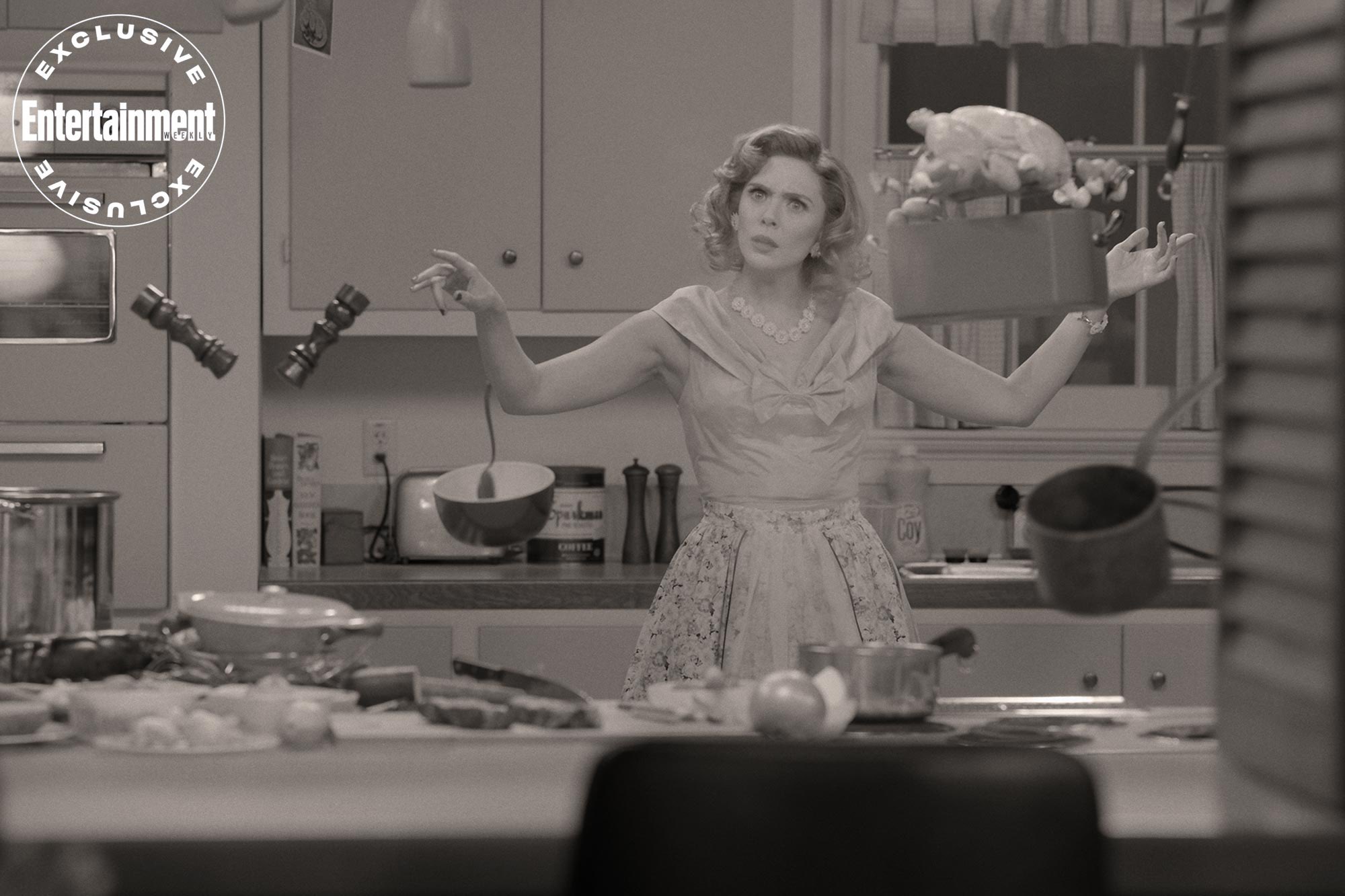 Elizabeth Olsen as Scarlet Witch levitating kitchen utensils